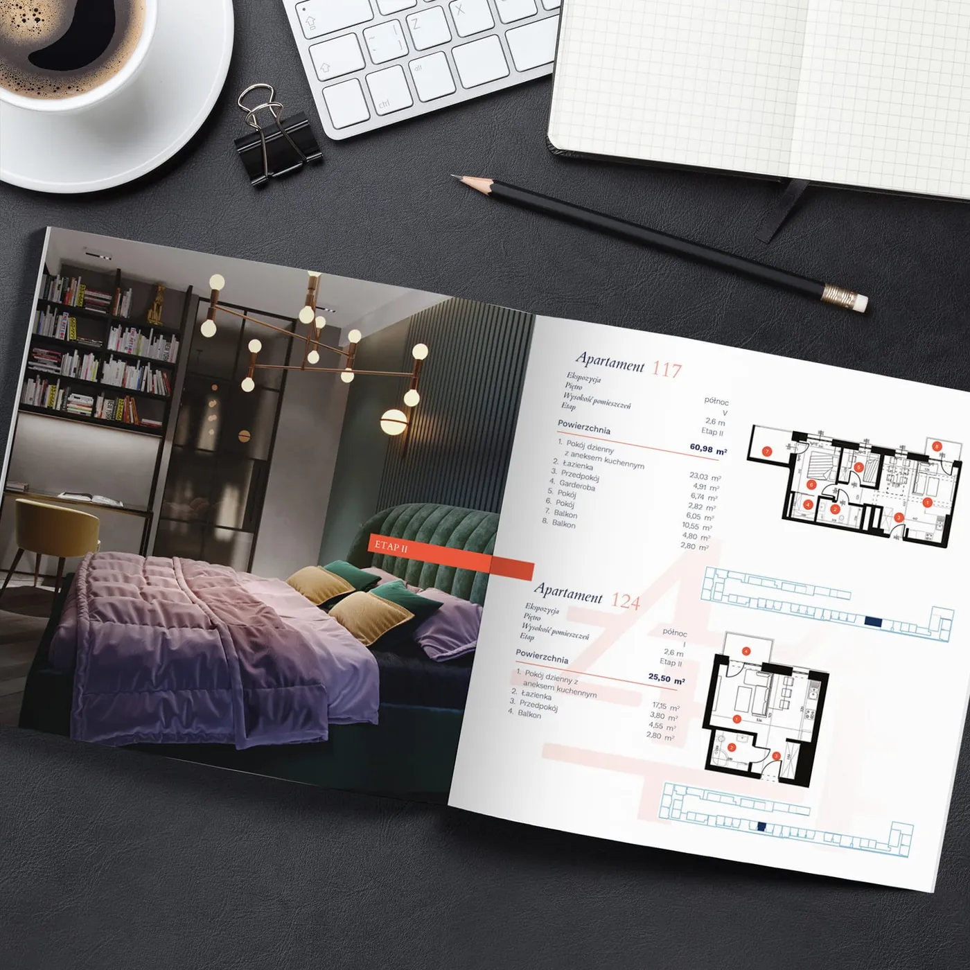 Katalog Piotrkowska 44 rozłożony na biurku: zdjęcie sypialni w wnętrzu apartamentu obok specyfikacji „Apartament 117" i „Apartament 124" z metrażami i rzutami mieszkań.