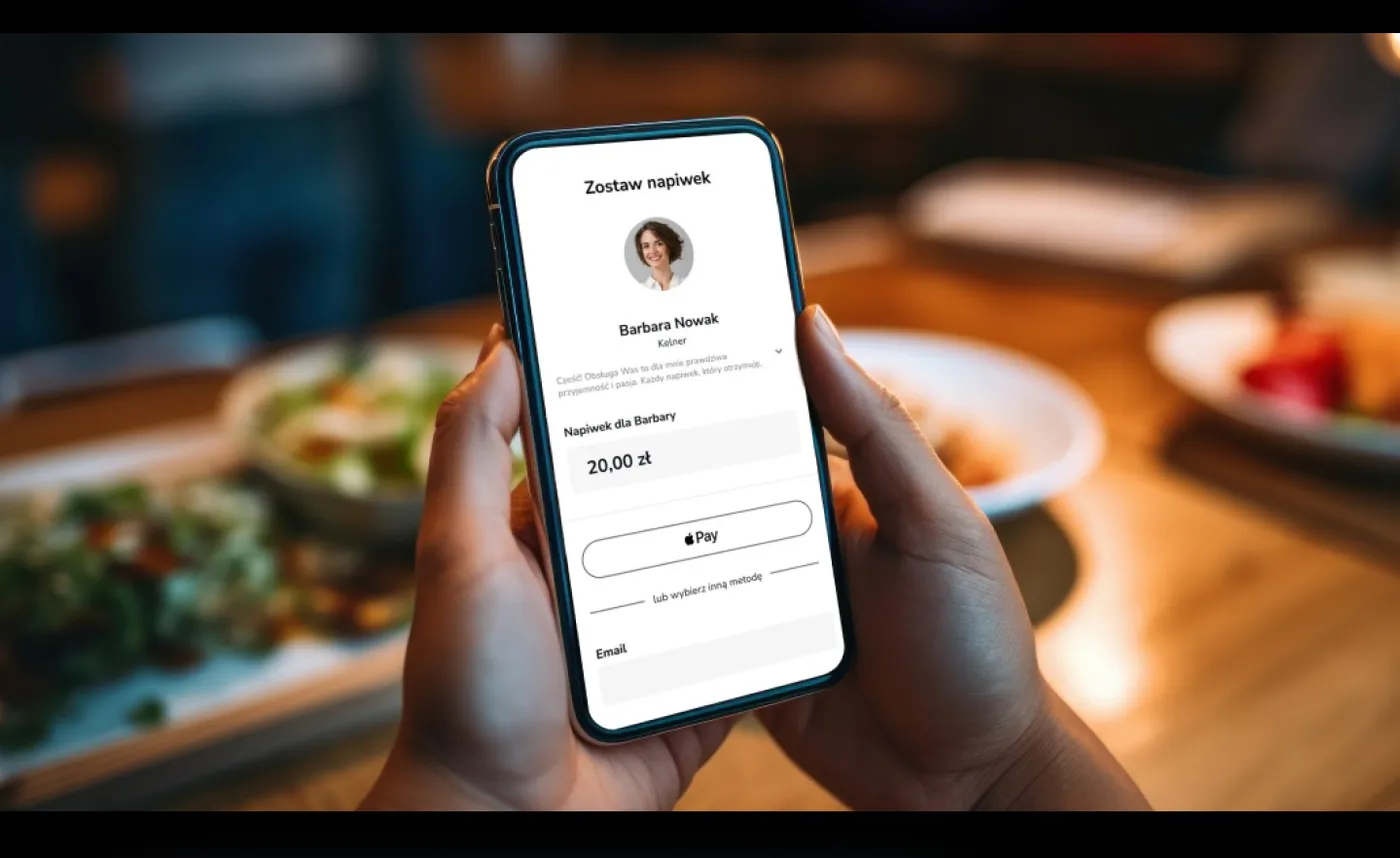 Tip Card - makieta rejestracji konta na telefonie trzymanym w dłoni, w scenerii restauracji.