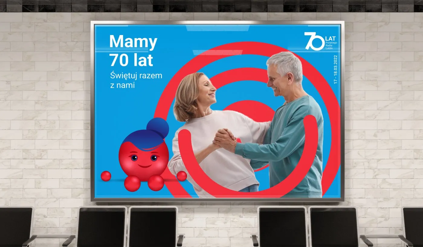 Radio Lublin - wielkoformatowy billboard „Mamy 70 lat. Świętuj razem z nami" z motywem tarczy i maskotką.
